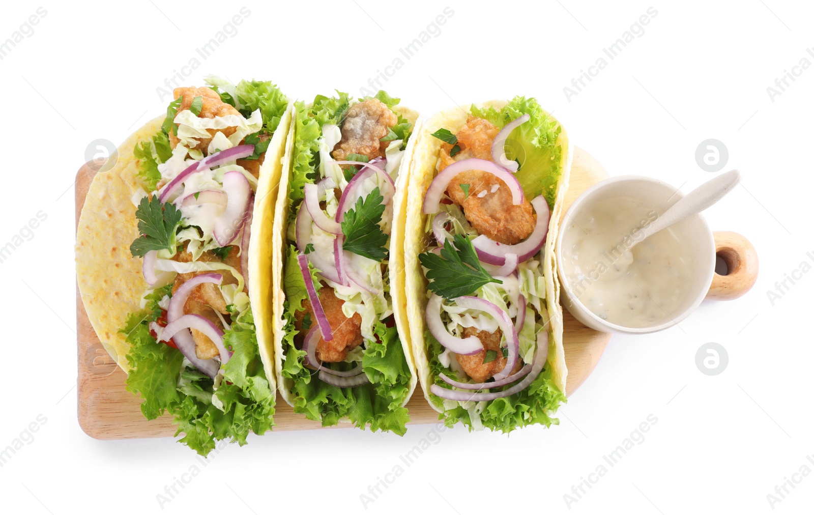 Yummy fish tacos with sauce isolated on white, top view Photo of Yummy fish tacos with sauce isolated on white, top view