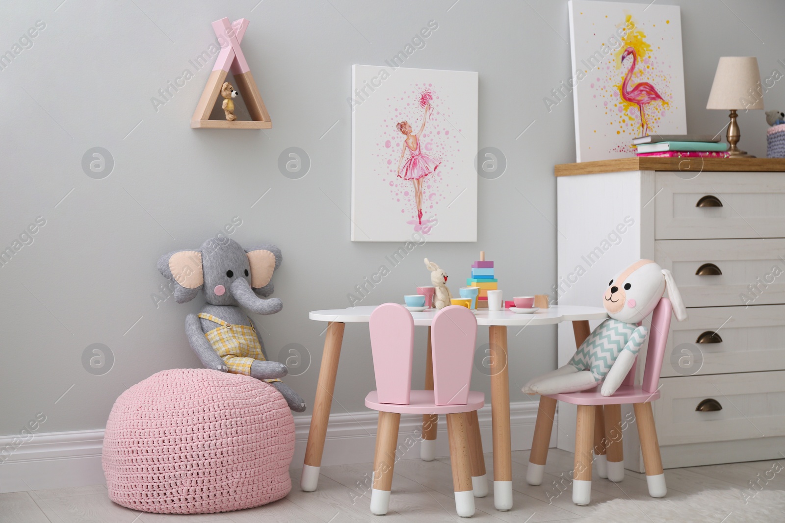 Children's room with modern furniture and pictures. Interior design Photo of Children's room with modern furniture and pictures. Interior design