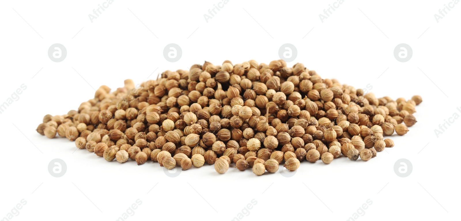 Heap of dried coriander seeds on white background Photo of Heap of dried coriander seeds on white background