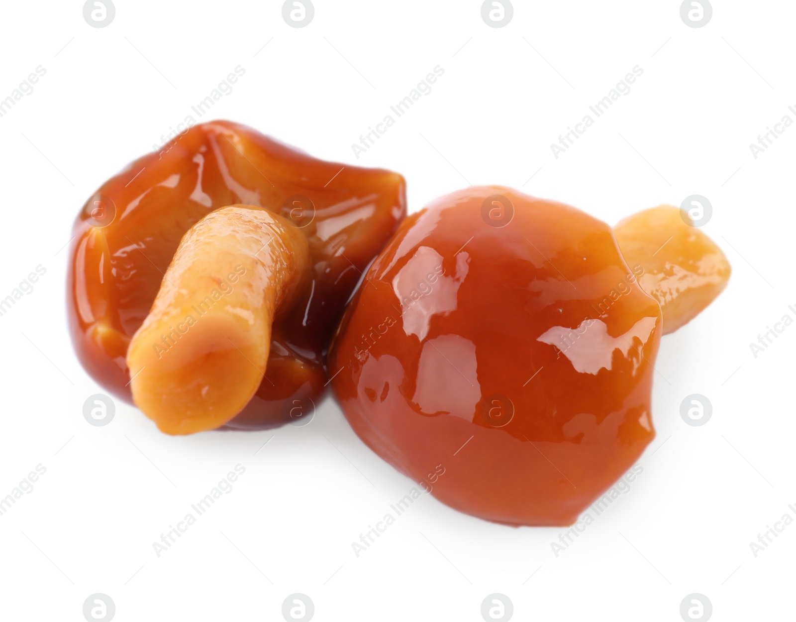 Photo of Tasty marinated honey fungus mushrooms on white background