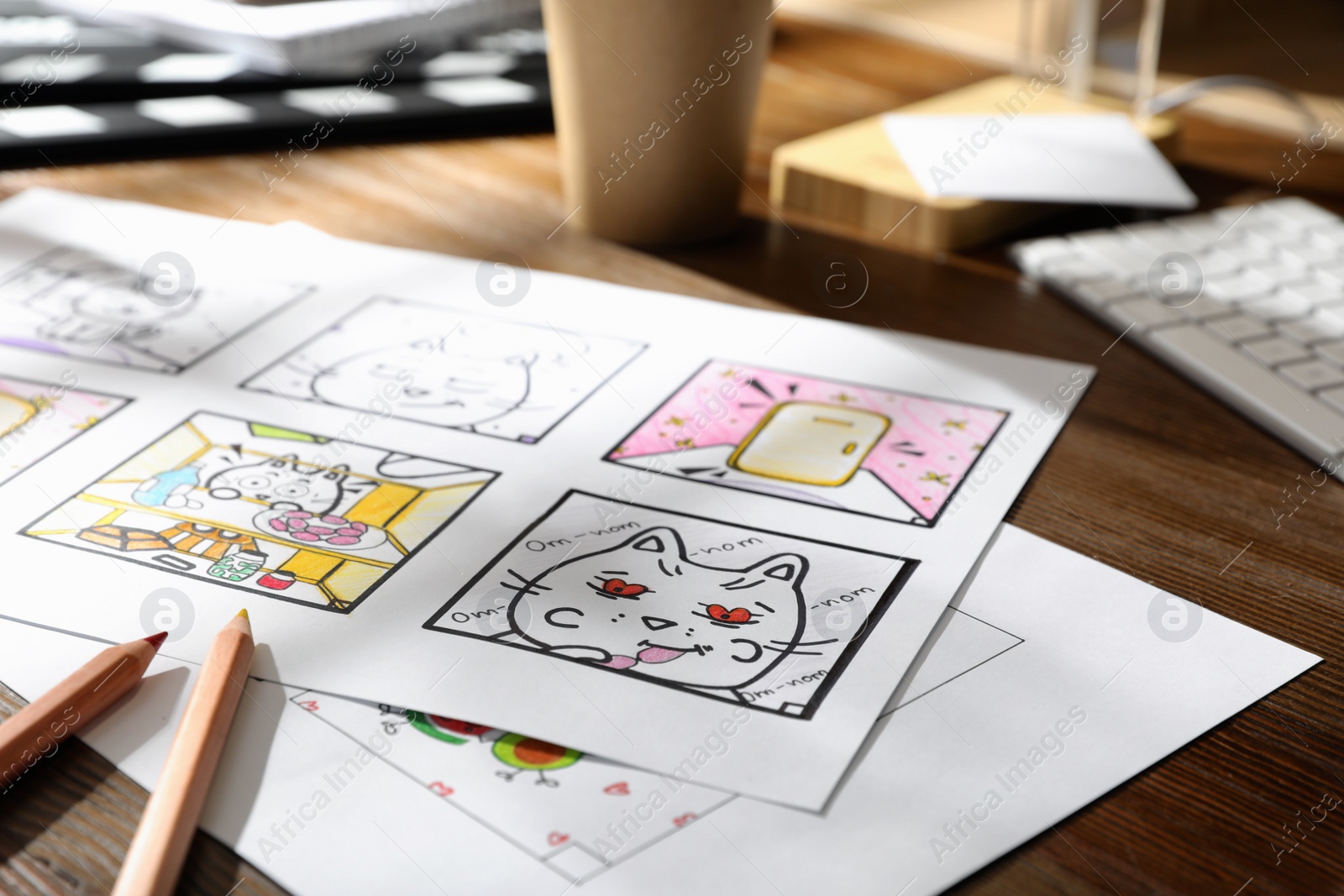 Storyboard with cartoon sketches at workplace. Pre-production process Photo of Storyboard with cartoon sketches at workplace. Pre-production process