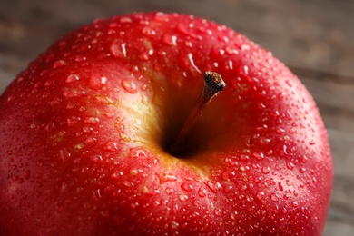 Ripe red apple with water drops, closeup Photo of Ripe red apple with water drops, closeup