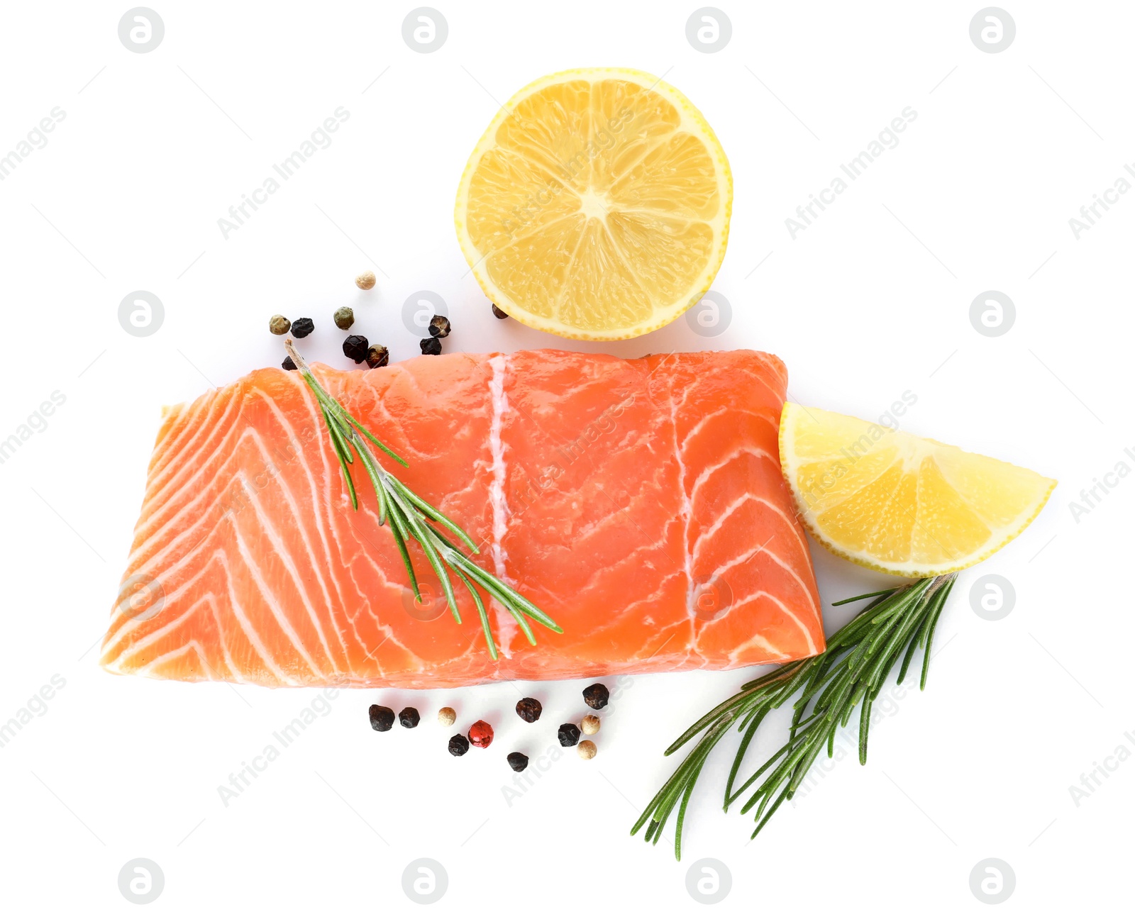 Fresh raw salmon with pepper, lemon and rosemary on white background, top view. Fish delicacy Photo of Fresh raw salmon with pepper, lemon and rosemary on white background, top view. Fish delicacy
