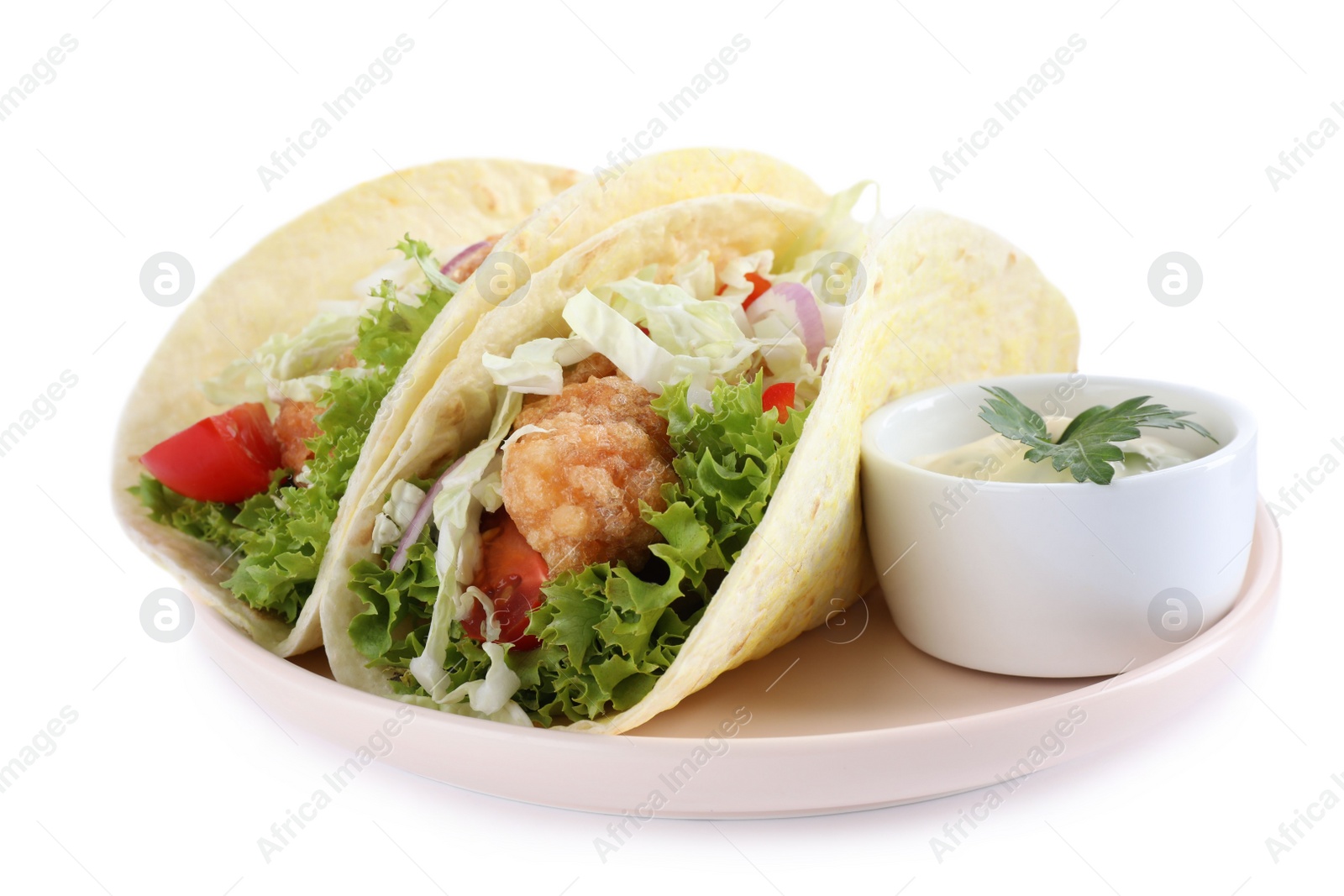 Yummy fish tacos with sauce isolated on white Photo of Yummy fish tacos with sauce isolated on white