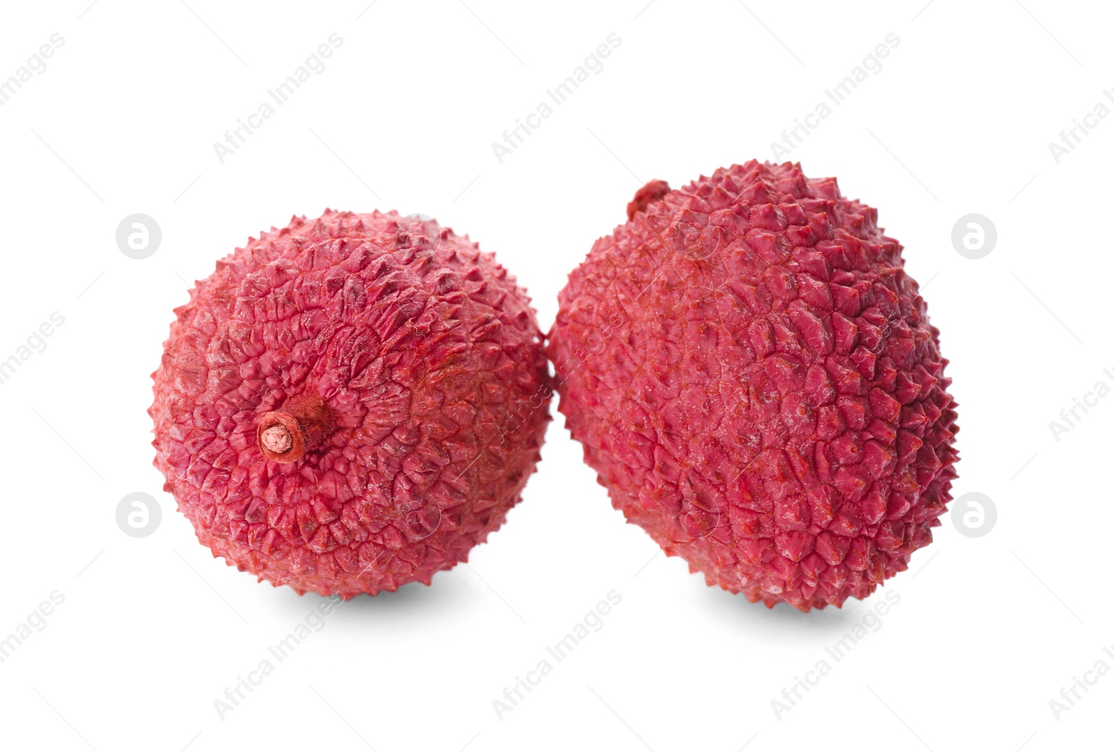 Fresh ripe lychees on white background, closeup. Exotic fruit Photo of Fresh ripe lychees on white background, closeup. Exotic fruit