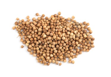 Heap of dried coriander seeds on white background, top view Photo of Heap of dried coriander seeds on white background, top view