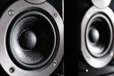 Modern powerful audio speakers as background, closeup Photo of Modern powerful audio speakers as background, closeup