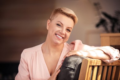 Portrait of beautiful happy woman at home Image of Portrait of beautiful happy woman at home