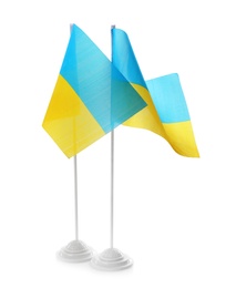 National flags of Ukraine isolated on white Photo of National flags of Ukraine isolated on white