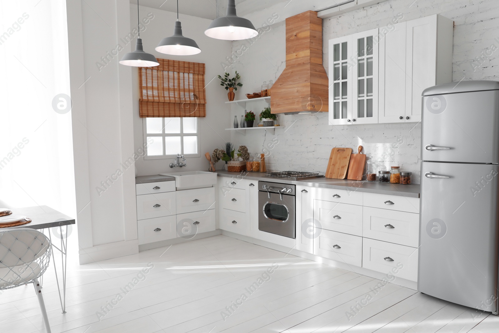 Beautiful kitchen interior with new stylish furniture Photo of Beautiful kitchen interior with new stylish furniture