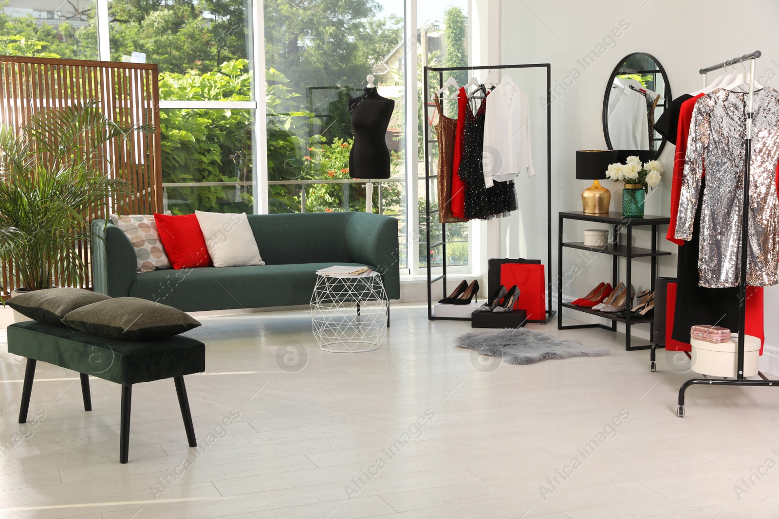 Modern wardrobe room interior with stylish furniture Photo of Modern wardrobe room interior with stylish furniture