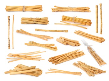 Set with delicious crispy grissini sticks on white background Image of Set with delicious crispy grissini sticks on white background