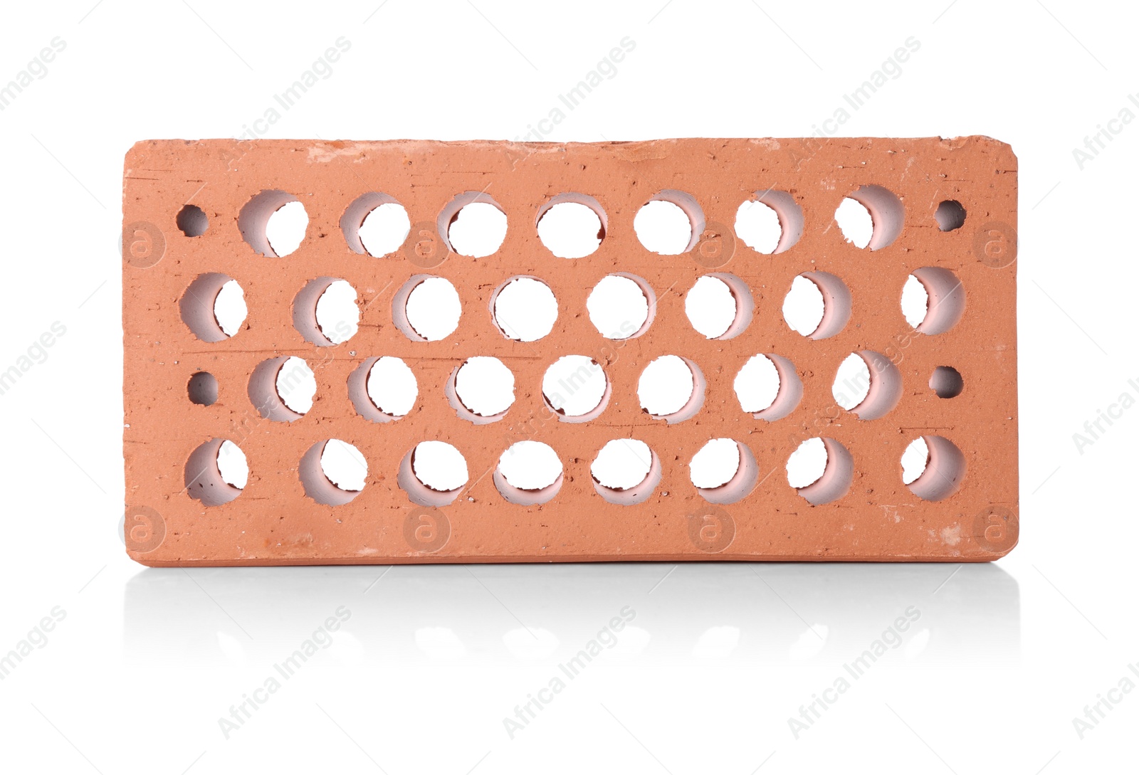 One red brick isolated on white. Building material Photo of One red brick isolated on white. Building material