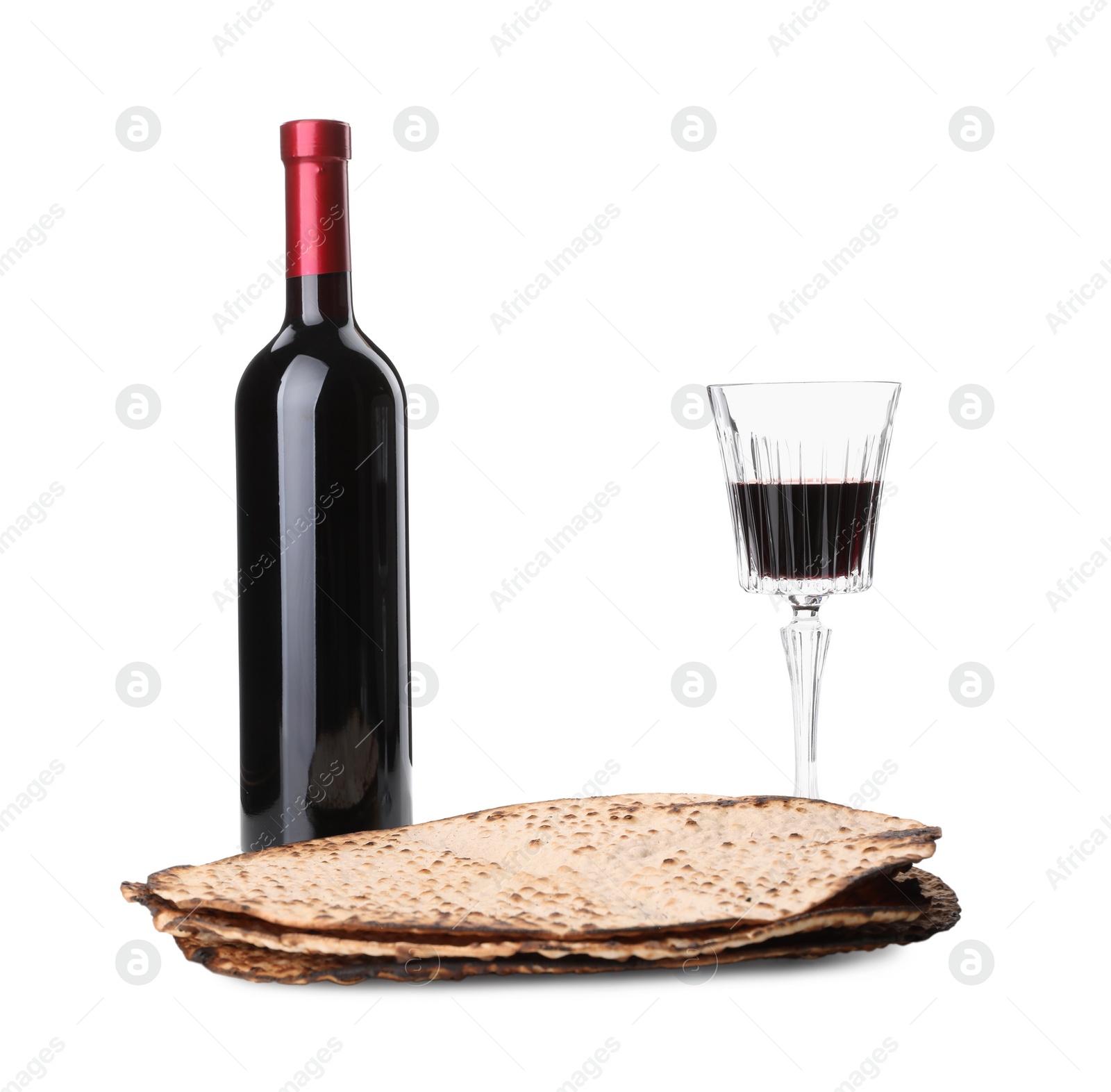 Tasty matzos and wine on white background. Passover (Pesach) celebration Photo of Tasty matzos and wine on white background. Passover (Pesach) celebration