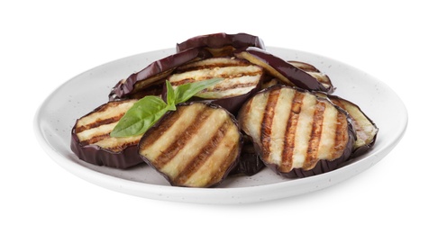 Delicious grilled eggplant slices with basil isolated on white Photo of Delicious grilled eggplant slices with basil isolated on white
