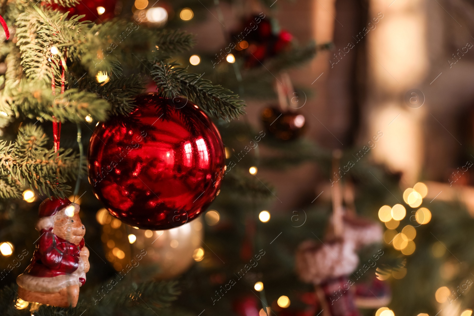 Closeup view of beautifully decorated Christmas tree indoors Photo of Closeup view of beautifully decorated Christmas tree indoors