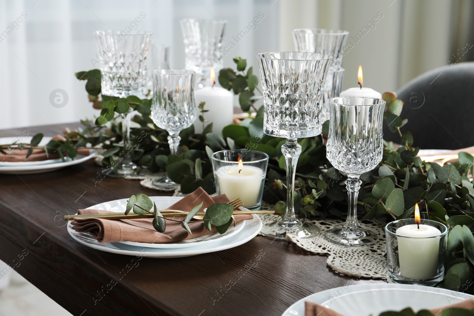 Stylish elegant table setting for festive dinner indoors Photo of Stylish elegant table setting for festive dinner indoors