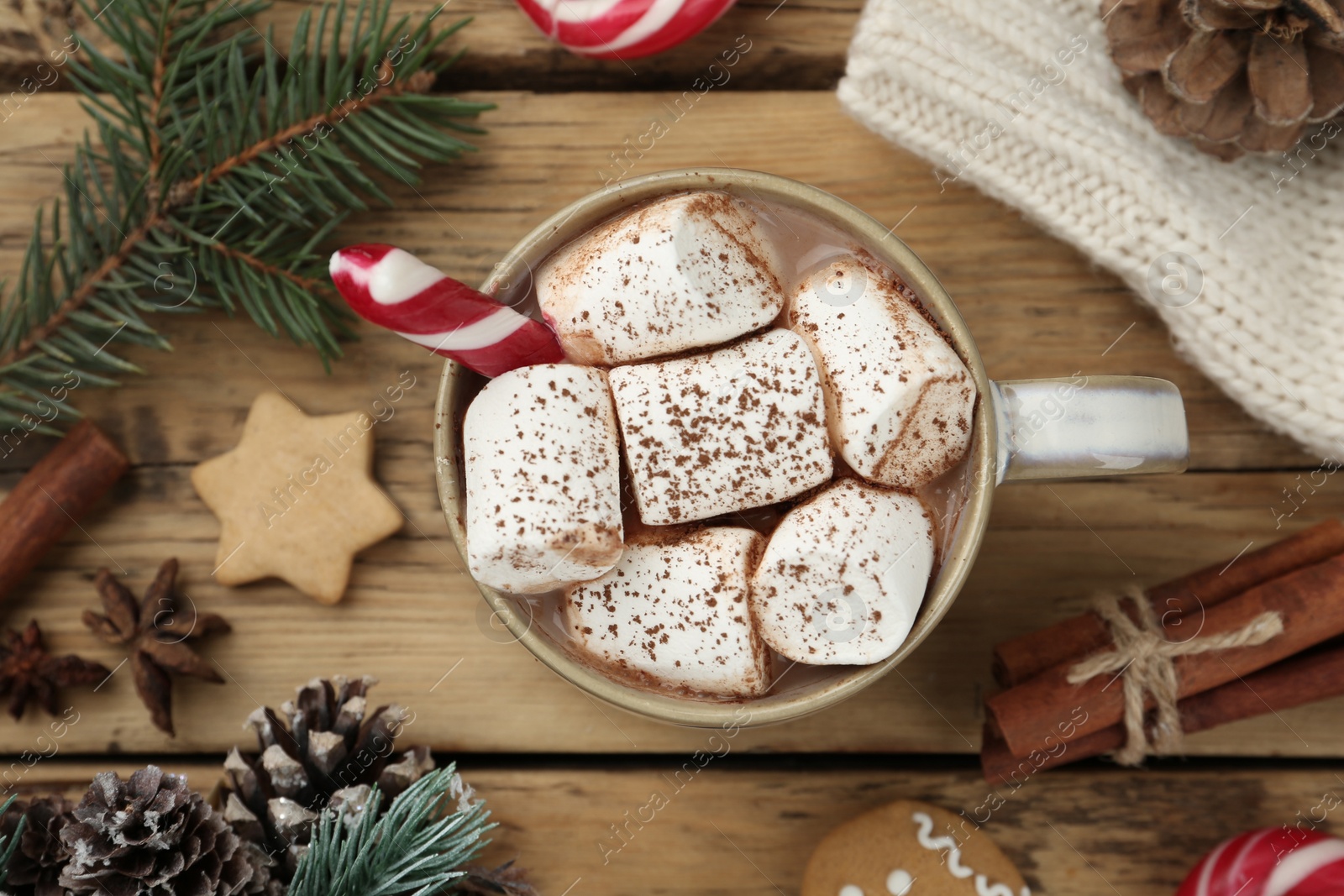Flat lay composition with delicious marshmallow cocoa and Christmas decor on wooden table Photo of Flat lay composition with delicious marshmallow cocoa and Christmas decor on wooden table