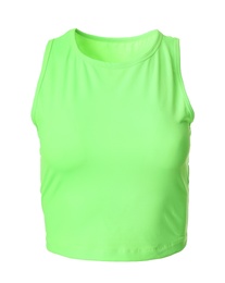 Green women's top isolated on white. Sports clothing Photo of Green women's top isolated on white. Sports clothing