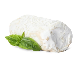 Delicious fresh goat cheese with basil on white background Photo of Delicious fresh goat cheese with basil on white background