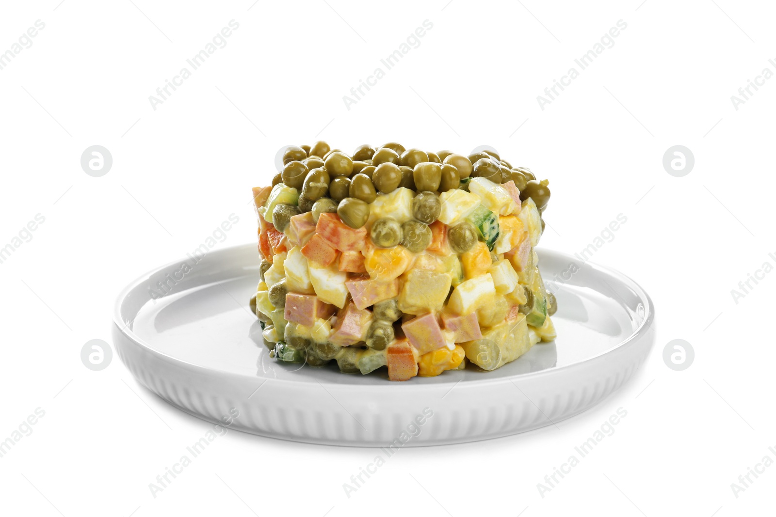 Delicious russian salad Olivier on white background Photo of Delicious russian salad Olivier on white background