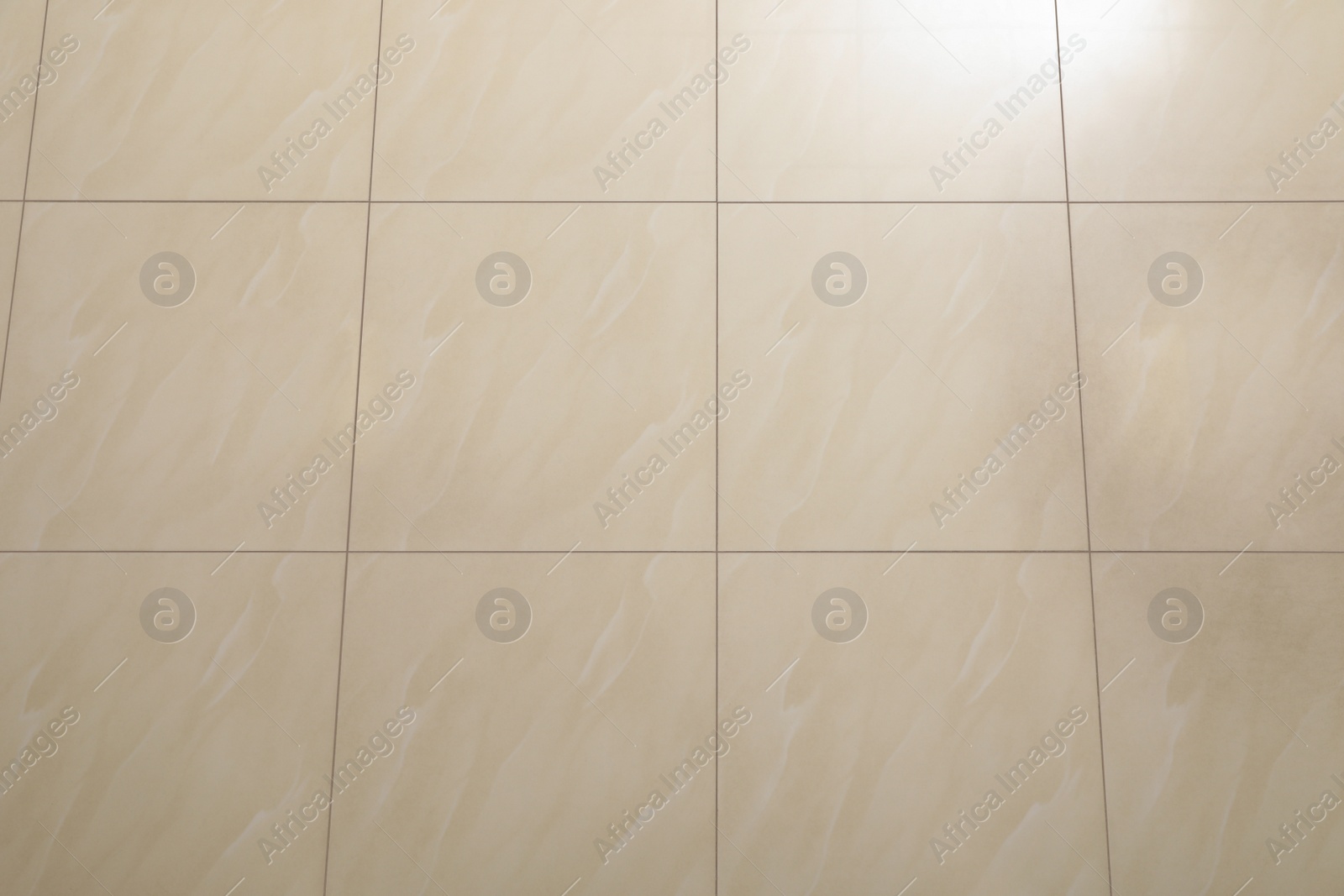 Ceramic tiled floor as background, above view Photo of Ceramic tiled floor as background, above view