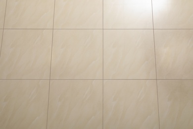 Photo of Ceramic tiled floor as background, above view