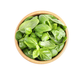 Photo of Fresh green basil leaves in wooden bowl isolated on white, top view