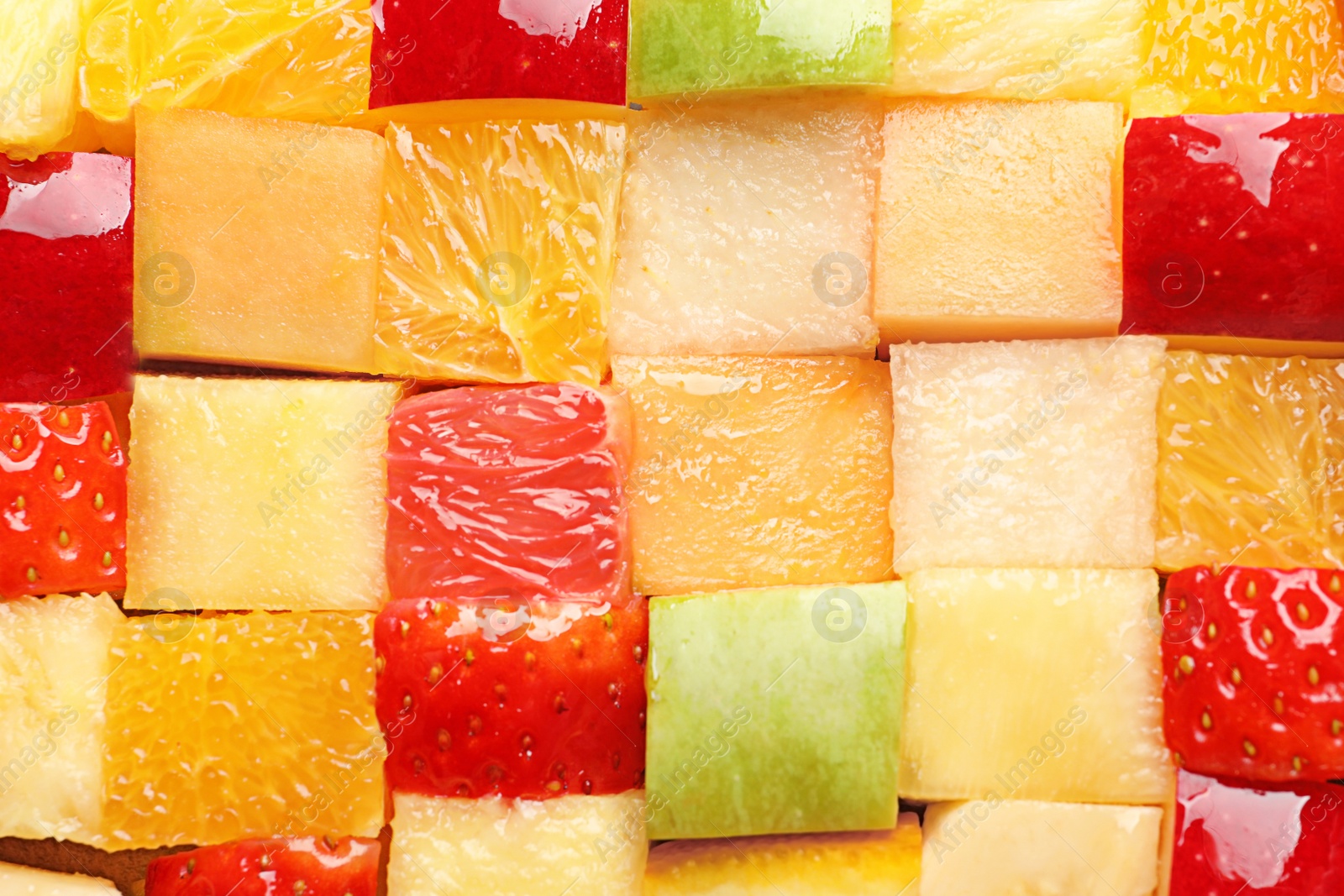 Fresh cut fruits as background Photo of Fresh cut fruits as background