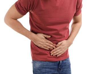 Man suffering from pain in lower right abdomen on white background, closeup. Acute appendicitis Photo of Man suffering from pain in lower right abdomen on white background, closeup. Acute appendicitis