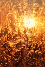 Photo of Beautiful frosty window as background, closeup. Winter morning