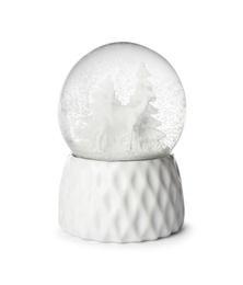 Beautiful snow globe with deer and tree isolated on white Photo of Beautiful snow globe with deer and tree isolated on white