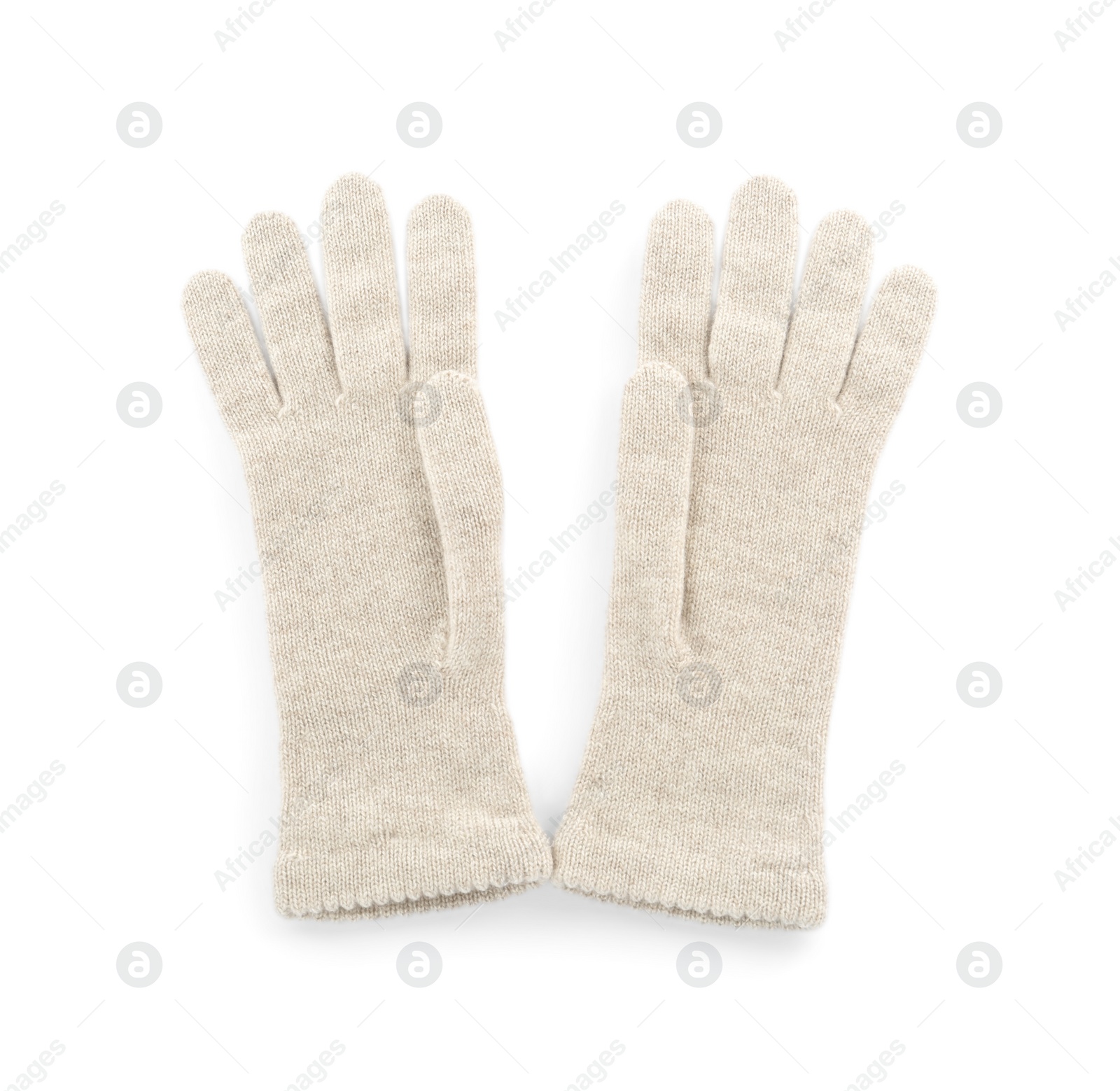 Photo of Pair of woolen gloves on white background, top view. Winter clothes