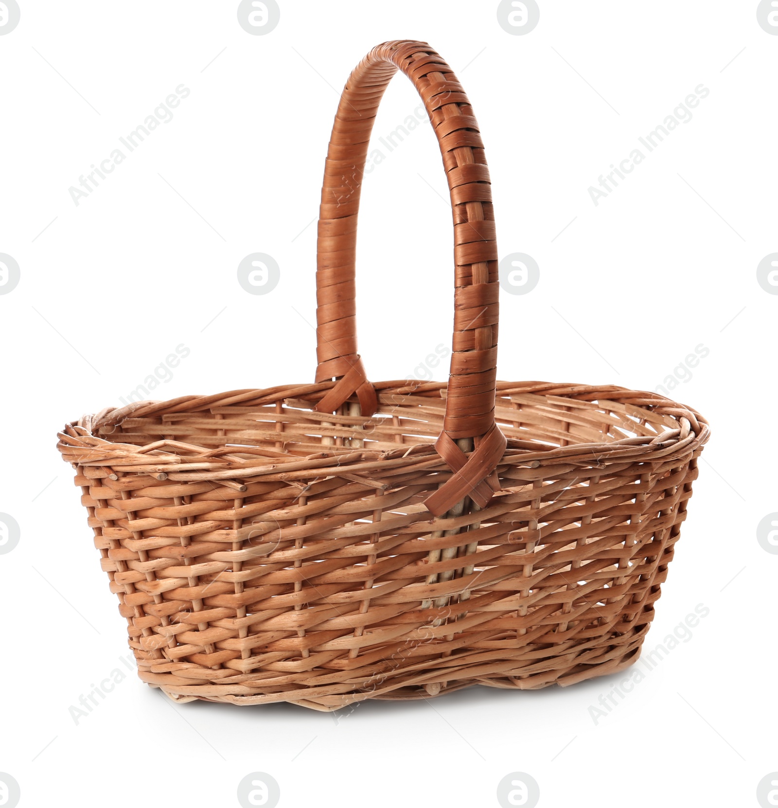 Empty wicker basket isolated on white. Easter item Photo of Empty wicker basket isolated on white. Easter item