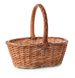 Empty wicker basket isolated on white. Easter item Photo of Empty wicker basket isolated on white. Easter item