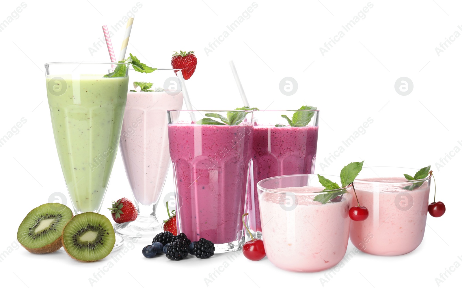 Different tasty milk shakes on white background Image of Different tasty milk shakes on white background