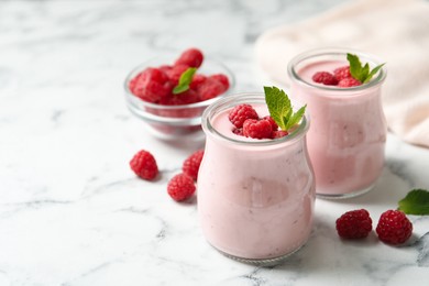 Yummy raspberry smoothie on white marble table Image of Yummy raspberry smoothie on white marble table