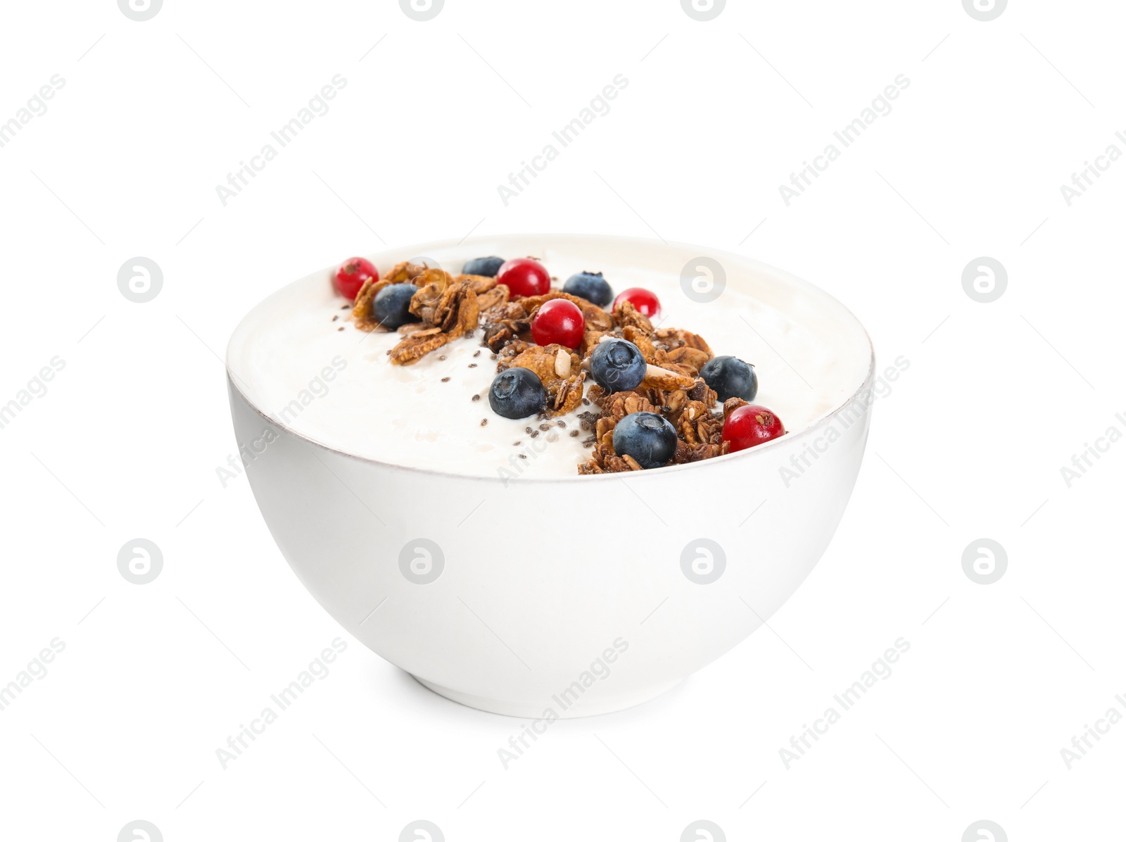 Delicious yogurt with granola and berries in bowl isolated on white Photo of Delicious yogurt with granola and berries in bowl isolated on white
