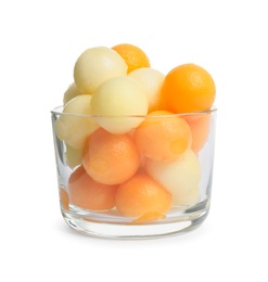 Melon balls in glass isolated on white Photo of Melon balls in glass isolated on white