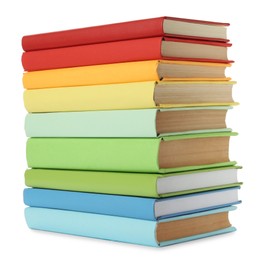 Many colorful hardcover books on white background Photo of Many colorful hardcover books on white background