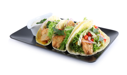 Yummy fish tacos with sauce isolated on white Photo of Yummy fish tacos with sauce isolated on white