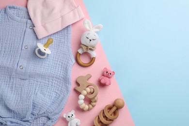 Flat lay composition with baby clothes and accessories on color background, space for text Photo of Flat lay composition with baby clothes and accessories on color background, space for text