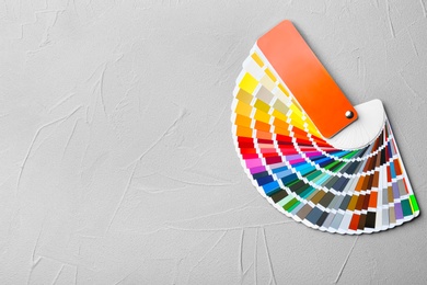 Color palette samples on grey background Photo of Color palette samples on grey background