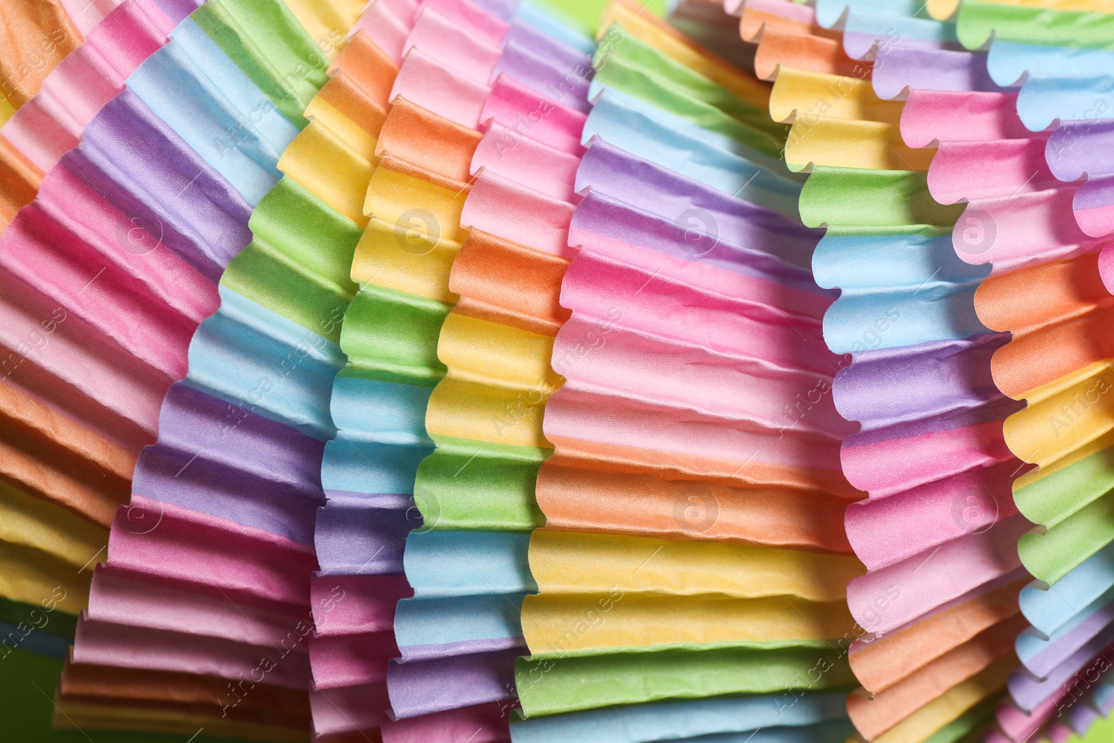 Colorful paper cupcake molds as background, closeup Photo of Colorful paper cupcake molds as background, closeup