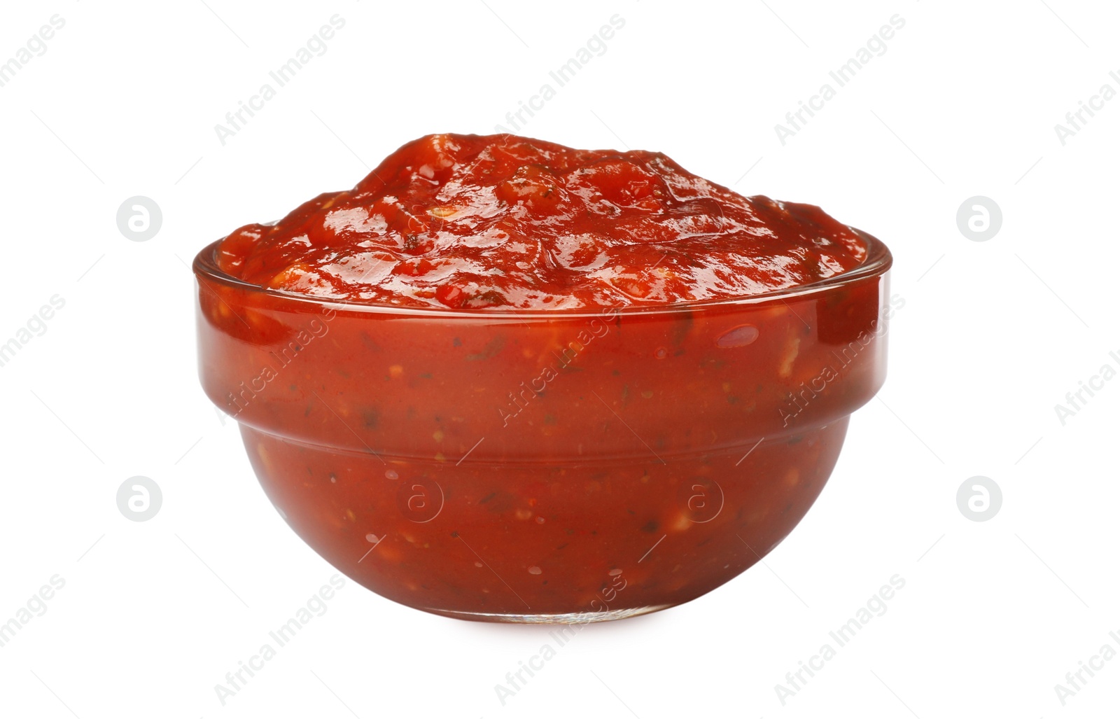 Delicious adjika sauce in glass bowl isolated on white Photo of Delicious adjika sauce in glass bowl isolated on white