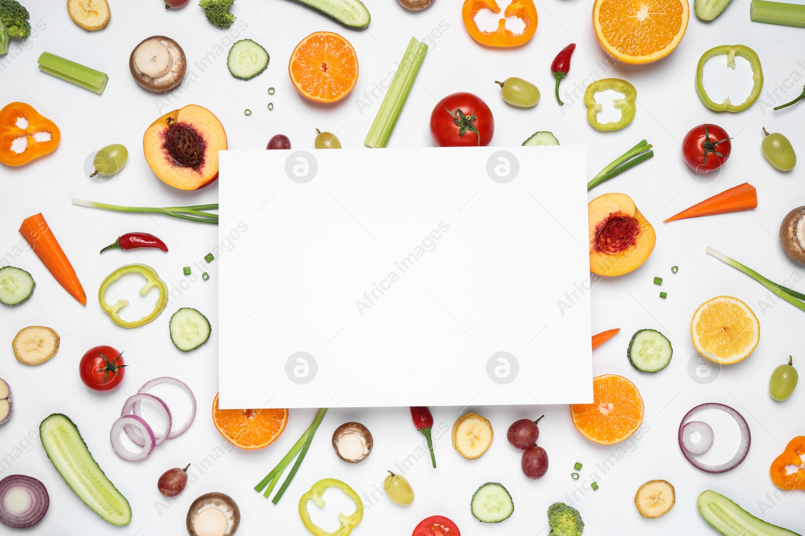 Fresh organic fruits, vegetables and blank card on white background, flat lay. Space for text Photo of Fresh organic fruits, vegetables and blank card on white background, flat lay. Space for text