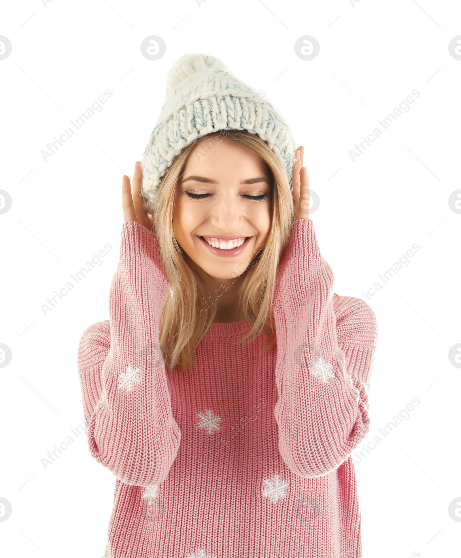 Portrait of happy young woman in warm clothing on white background. Ready for winter vacation Photo of Portrait of happy young woman in warm clothing on white background. Ready for winter vacation
