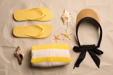 Photo of Flat lay composition with beach objects on sand