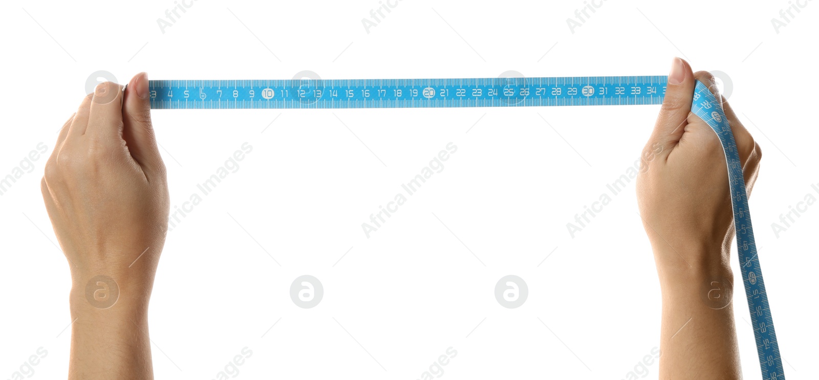 Woman holding light blue measuring tape on white background, closeup Photo of Woman holding light blue measuring tape on white background, closeup