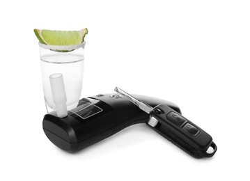 Modern breathalyzer, alcohol and car key on white background Photo of Modern breathalyzer, alcohol and car key on white background
